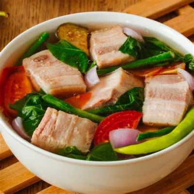  Sinigang na Baboy! A Tangy and Creamy Culinary Symphony from the Heart of Western Visayas